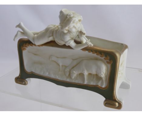 A Continental Jardiniere, depicting a shepherd boy playing a flute.