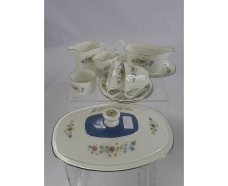 A Royal Doulton 'Pastoral' Service, comprising nine cups, ten saucers, two milk jugs, one creamer, two sugar bowls, ten side 