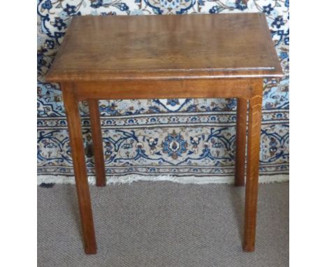 An Antique Arts & Crafts Oak Occasional Table, in the style of Gordon Russell, on hectagonal legs, approx 61 x 45  x 65 cms.