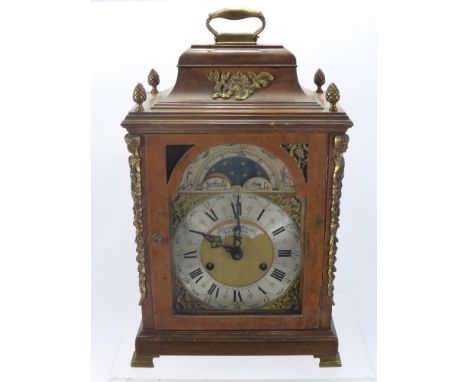 A Thomas Smith London Bracket Clock in Walnut Case, the 6" brass arched dial marked Thomas & Smith, on a silvered plaque to t
