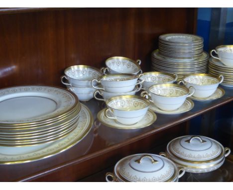 A Fine Bone China 'Aynsley' Dinner Service, comprising two lidded serving dishes, oval meat plate, eleven soup bowls and sauc