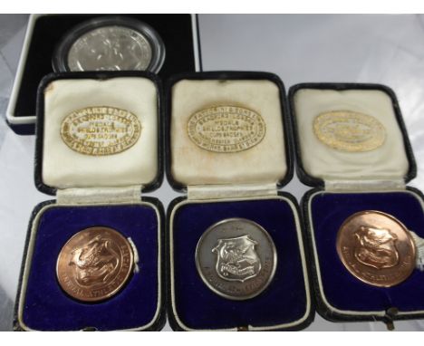 A Collection of Three Vintage Solid Silver (2 gold plated) Seaford College Annual Athletic Sports Medallions, in original Fat