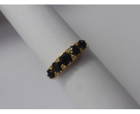 A Lady's 9 ct Gold 5 Stone Garnet Ring, size O, wt 2.5 gms.