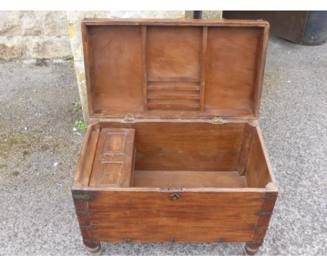 A Georgian Mahogany Campaign Chest, the chest having panel lidded candle box with letter rack, on turned feet, approx 37 x 64