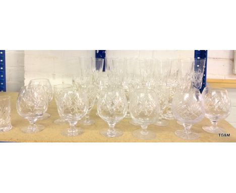 A large quantity of crystal and cut glass to include a set of Brandy glasses (36)