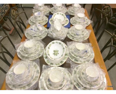 A Royal Worcester hop design dinner service, 12 place settings Mathon (new)