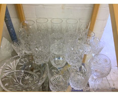 A large quantity of crystal and cut glass to include brandy glasses, whisky tumblers and water jugs (25)