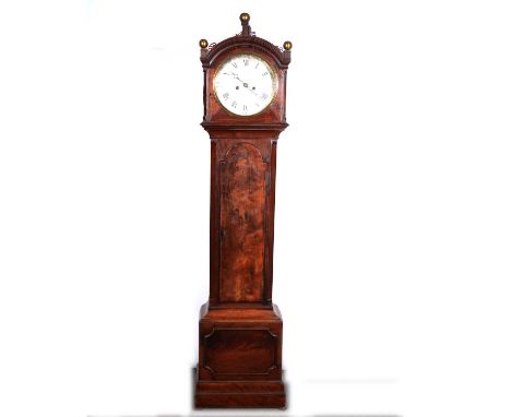 Regency mahogany longcase clock, domed hood with brass spheres, cavetto moulded cornice, above canted corners, twelve-inch ci