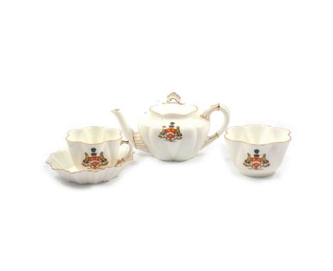 Shelley crested china tea-for-two, Market Harborough town crest, lotus shape, and another crested tea cup and saucer by Willo