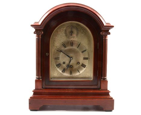 'Red' mahogany mantel clock, arched silvered dial with subsidiary Strike/Silent dial, Westminster chiming movement on eight g