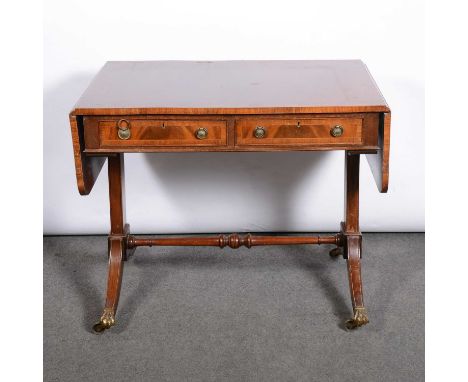 Reproduction mahogany sofa table, the top with crossbanding and two drop leaves, splayed legs joined by a turned rail, width 