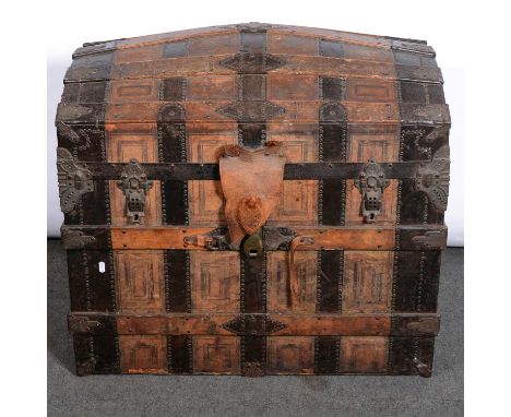 Large dome-top shipping trunk, with wooden lathes and metal straps, width 85cm, depth 54cm, height 78cm.