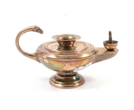 A "Welsh" silver Aladdin’s lamp table lighter, stamped WB Silver, 7.5cm, bird head finial to handle, approx. 4oz.