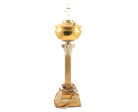 Brass oil lamp, Corinthian column form, adapted for electricity, height  60cm including fitting.