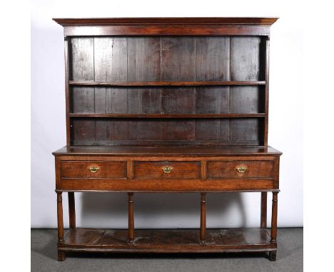 Oak dresser, early 19th Century, two shelf rack, three drawers under, turned supports with a pot board base, width 178cm, dep