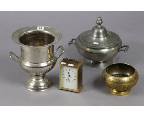 A silvered-metal campana-shaped ice-bucket, 24.75cm high; a steel pot-pourri vase; a stick stand; a modern mantel clock; &amp