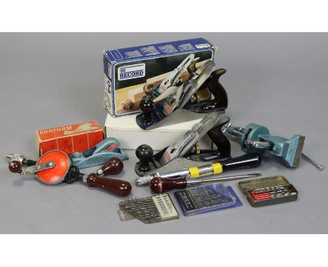 A Record “No. 04” smoothing plane; a Surform “No. 111” block plane, both boxed; a Stanley Bailey “No. 3” smoothing plane, unb