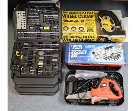 A Black &amp; Decker “Scorpion” electric saw; two socket sets, all cased; &amp; various other tools &amp; accessories. 