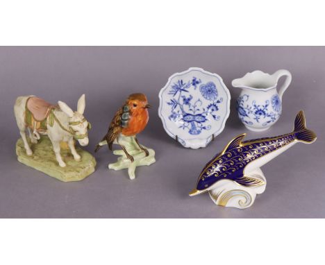 A Royal Dux porcelain model of a donkey, 13cm high (one ear restored); A Royal Crown Derby “Imari” dolphin paperweight; a Goe