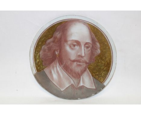 An old etched and coloured glass circular panel depicting a male bust portrait, 8" diameter