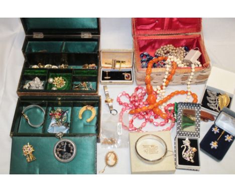 A quantity of various costume jewellery including necklaces, brooches, wristwatches, silver bangle etc.