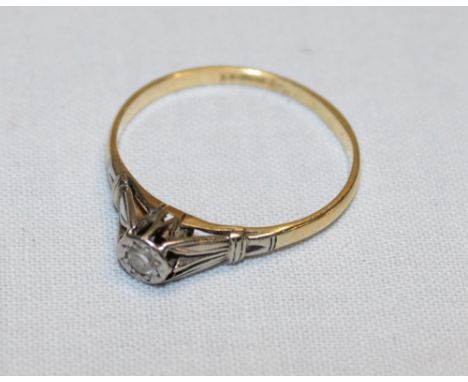 An 18ct gold engagement ring set a single diamond (1.9g)