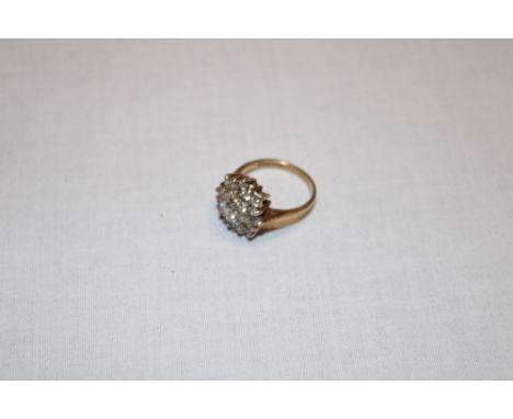 A 9ct gold dress ring set cubic zirconia cluster (3.8g)