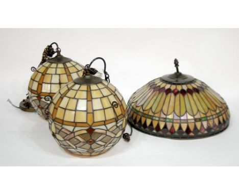 THREE TIFFANY STYLE LEADED CEILING LIGHTS, comprising; a FOUR LIGHT BOWL TYPE SHADE, 10" (25.4cm) high, 16" (40.7cm) diameter