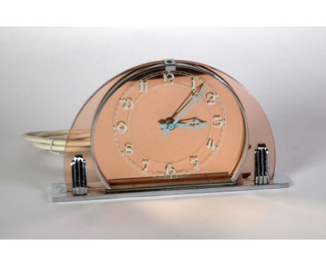 S.E.C., ART DECO ELECTRIC MANTEL CLOCK, the 4" Arabic mirror glazed dial in a dome top case with tinted glass panel and chrom