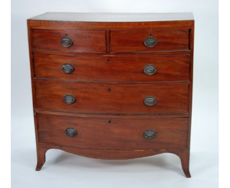 EARLY NINETEENTH CENTURY MAHOGANY BOW FRONTED CHEST OF DRAWERS, the shaped top outlined in ebony above two short and three lo