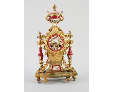 EARLY TWENTIETH CENTURY FRENCH GILT METAL AND PORCELAIN MOULDED MANTEL CLOCK, the 3 1/4" Roman pink porcelain dial with five 