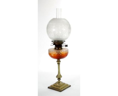 EDWARDIAN BRASS OIL TABLE LAMP, with etched orbicular shade, chimney and cut glass reservoir 