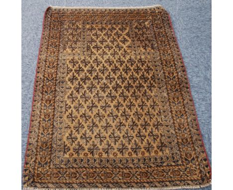 EASTERN PRAYER RUG, with rectangular mihrab, all over stylised flower head design on a light brown field, multiple narrow bor