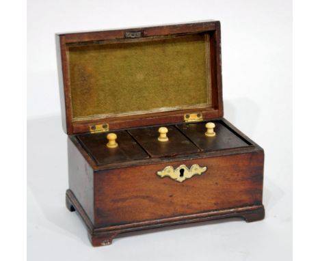 GEORGIAN MAHOGANY TEA CADDY of oblong form with brass escutcheon and top carry handle, three lidded compartments to the inter
