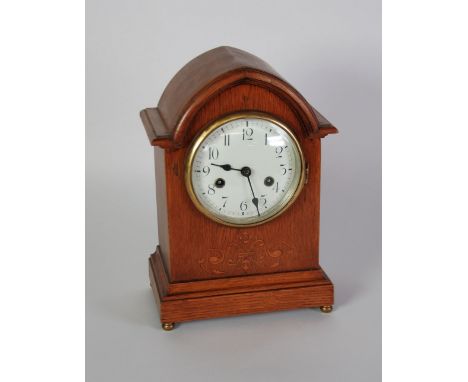EARLY TWENTIETH CENTURY OAK CASED MANTEL CLOCK, by Gustav Becker, the 5" Arabic dial powered by an eight day movement strikin