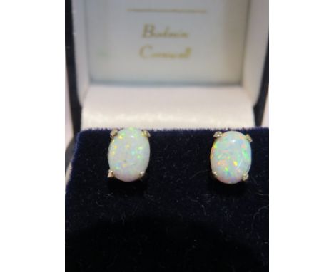 OPAL EARRINGS, pair of oval opal stud earrings set in 9ct yellow gold