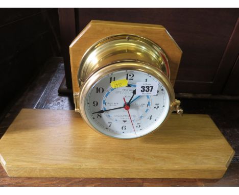 HERMLE TIDE CLOCK on oak plinth