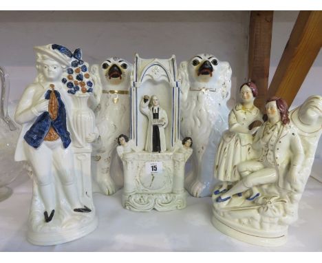 STAFFORDSHIRE POTTERY, pair of gilded seated spaniels, 12" high; also Wesley clock group and 2 other Staffordshire groups (va