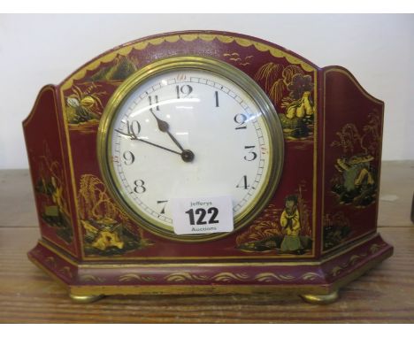 CHINOISERIE CLOCK, a raised red lacquer cased mantel clock, 5.5" high