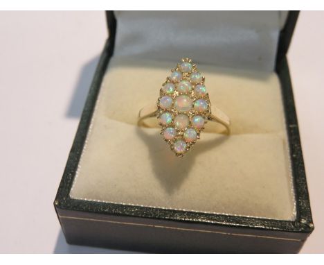 OPAL CLUSTER RING, 9ct yellow gold ring set a cluster of opals in lozenge form, size M