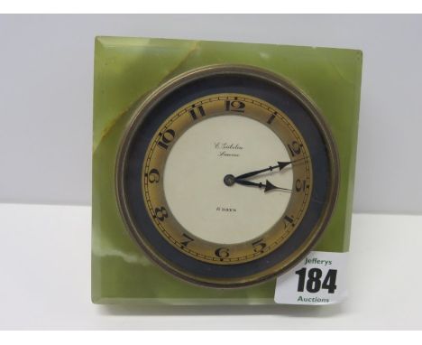 TABLE TOP CLOCK, onyx mounted table top 8 day clock by E.GUBELIN of Lucerne, 4" square