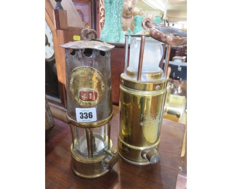 MINERS LAMPS; Brass and metal miners lamp by the Protector Lamp and Lighting Co. of Eccles, also a McGeoch 0583 miners lamp