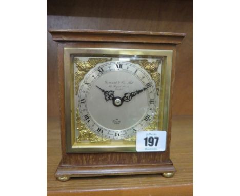 GARRARD MANTEL CLOCK, a Georgian design mantel clock by Elliott, 6" height