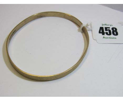 GOLD BANGLE, 9ct yellow gold bangle with engine turned decoration, 7.5 cm dia, Birmingham HM, 17 grams