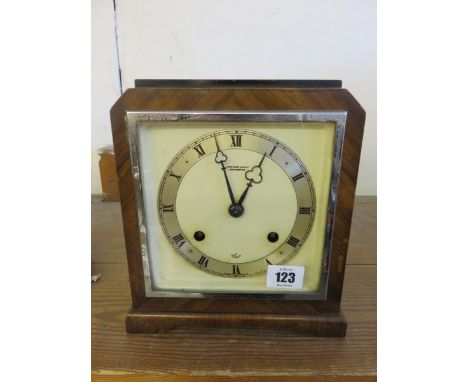 ART DECO MANTEL CLOCK, walnut and chrome cased coil bar strike mantel clock by Elliott, 9" high 