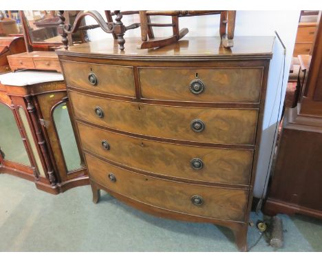 EARLY 19TH CENTURY BOW FRONT CHEST, 2 short & 3 long graduated drawers on splayed bracket feet with metal ring drop handles, 