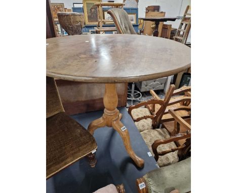 A victorian tripod table.