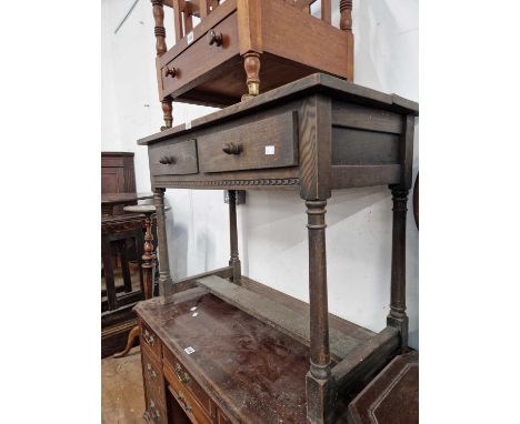 An oak two drawer side table together with a mahogany tripod torchere