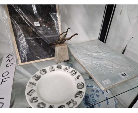 A Trevor Bell bronze diver, a pair of still lives, a pottery tile and a Wedgwood Ravilious side plate