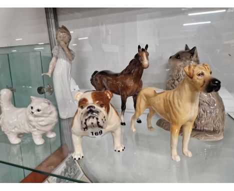 Two Doulton cats, two Beswick dogs, a horse and a Nao girl